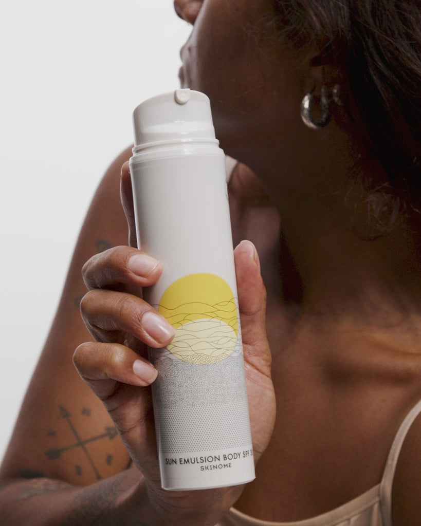Solskydd SPF 30 appliceras på arm – vårdande skydd för kroppen